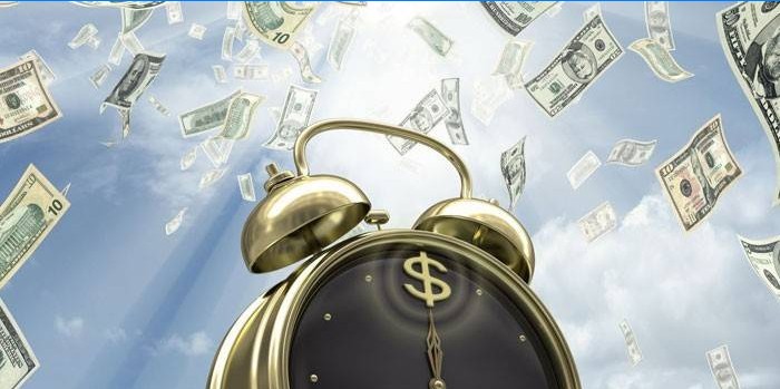 Horloge et billets dans le ciel