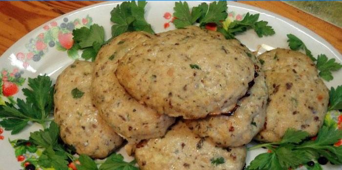 Escalopes de poisson haché au four sur une plaque