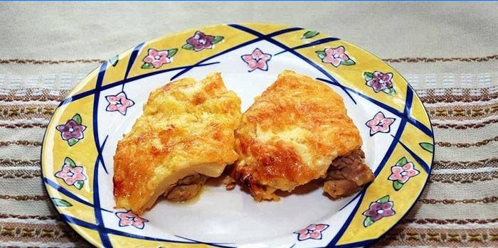Cuisses de poulet désossées au four sous fromage