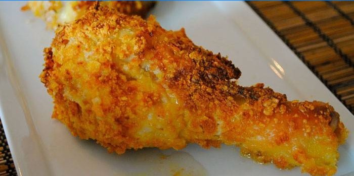 Pilon de poulet cuit dans la chapelure