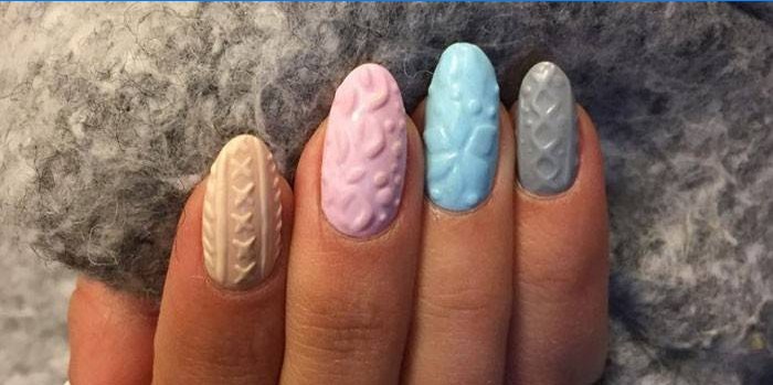 Conception d'ongle avec motif de chandail.