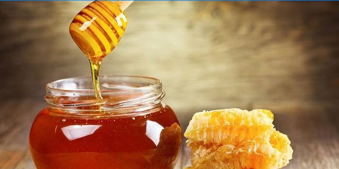 Miel en pot et en nid d'abeilles