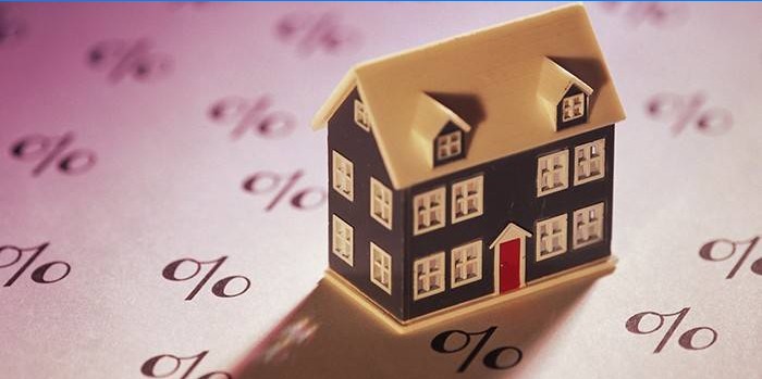 Maison en surface avec des icônes de pourcentage