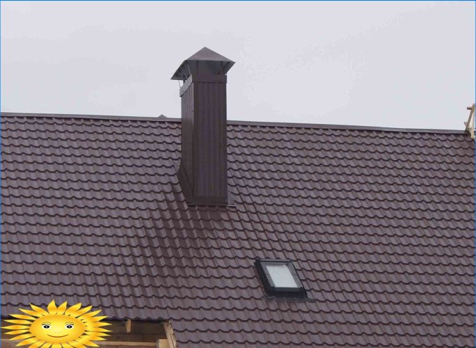 Passage de cheminée à travers une toiture métallique
