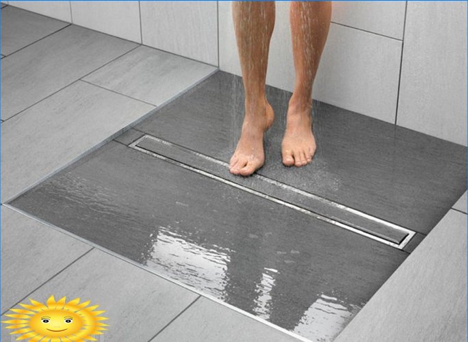 Drain de douche sous les carreaux: règles de conception et d'installation