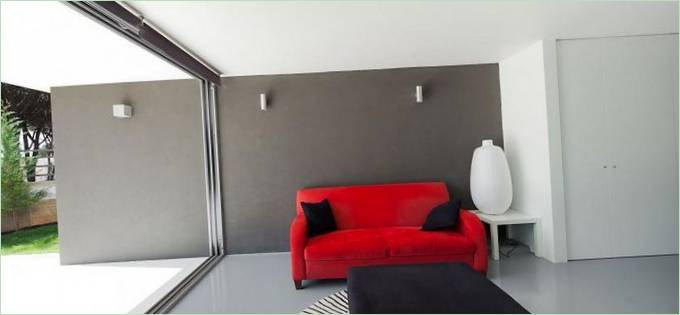 Un canapé coloré dans l'intérieur de la Maison Godiva