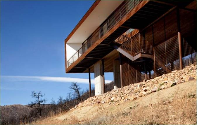 Une forêt en toile de fond pour une maison