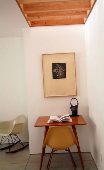 Projet d'une maison de plain-pied avec de grandes fenêtres : un coin lecture Projet d'une maison de plain-pied avec de grandes fenêtres : coin lecture