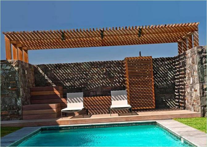 Piscine avec pergola couverte